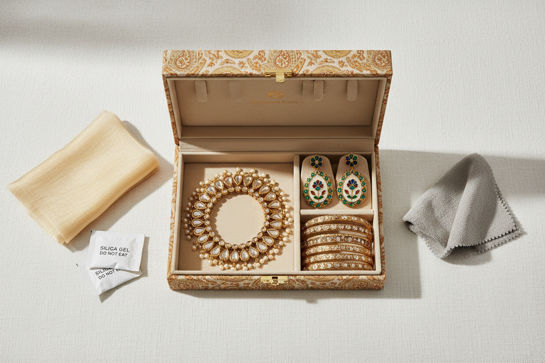 Indian fashion jewellery stored in a compartmentalised jewellery box with silica gel packets and a polishing cloth - jewellery care and storage tips by Vibha Jewelry